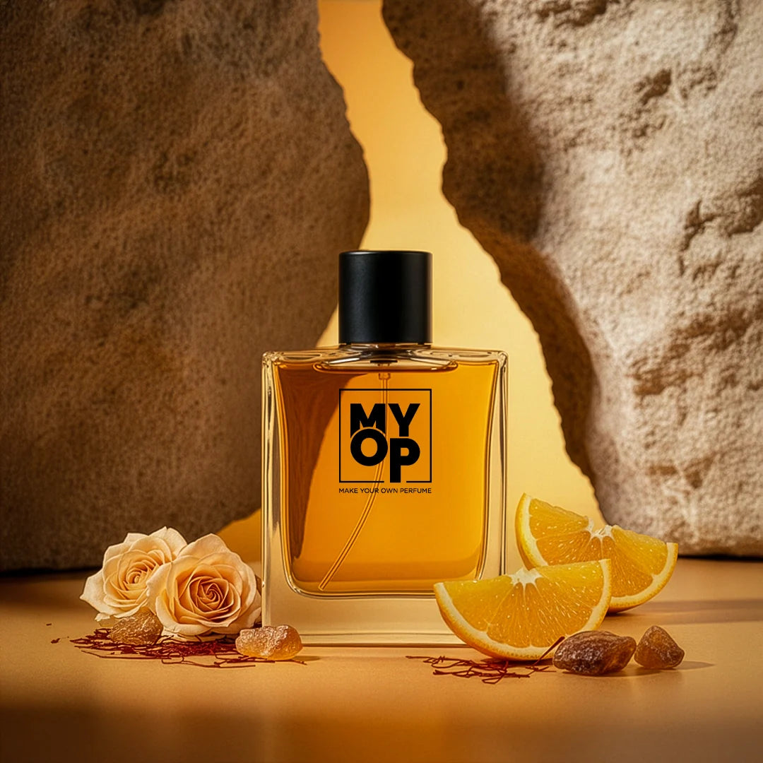 Perfume bottle with 'MYOP' branding surrounded by oranges and flowers on a textured background